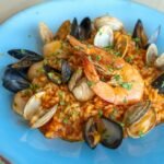 Seafood paella with shrimp, mussels, and clams